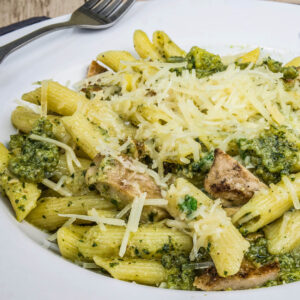 Penne pasta with spicy pesto and chicken